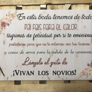 Cartel pai pai,lágrimas,conos y protectores fondo madera con flores